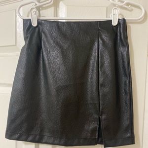 Black faux leather skirt. Never worn.